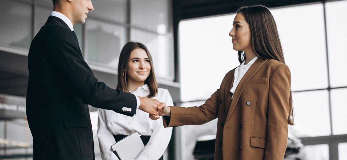 Male and female business people working on tablet in office